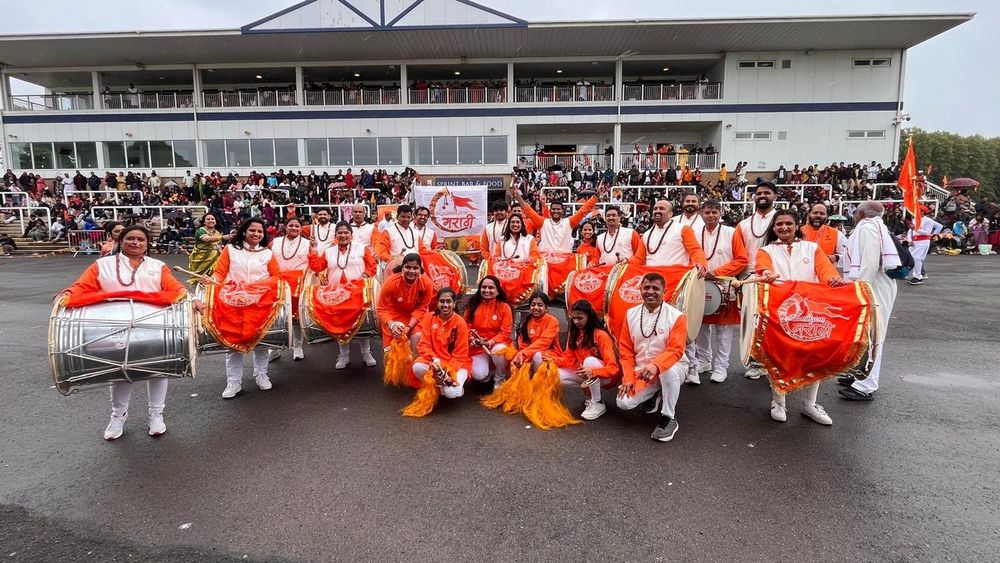 Pathak performing in full costume at the racecourse